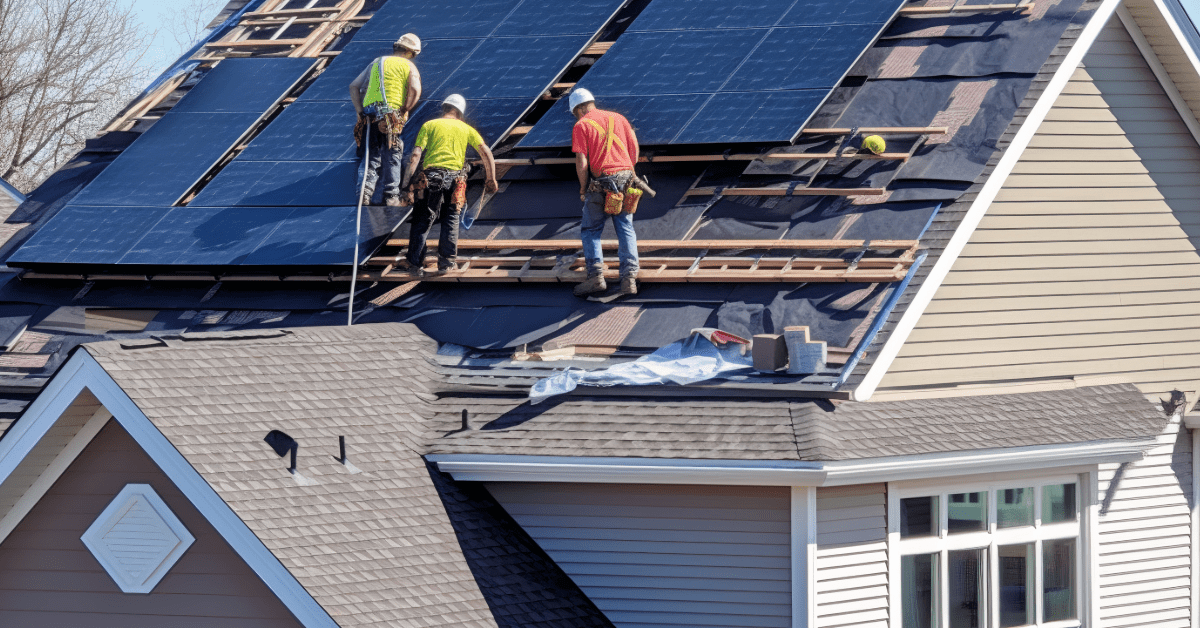 local solar team installing panels on Minnesota home roof