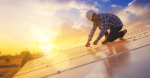 technician inspecting solar installation for quality and performance