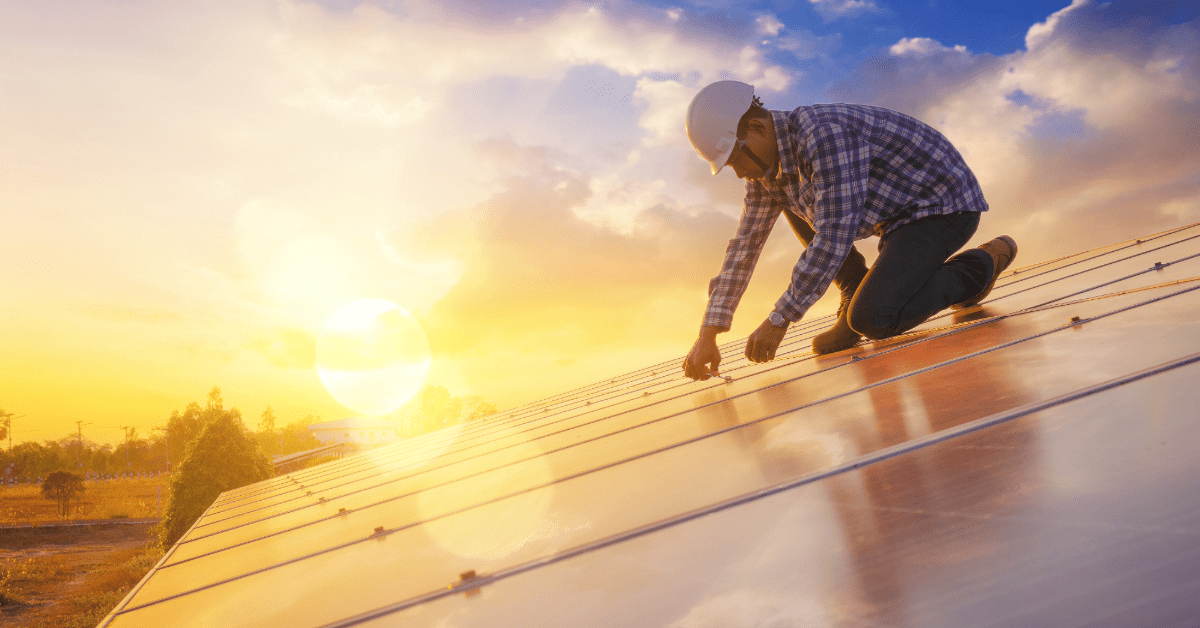 technician inspecting solar installation for quality and performance