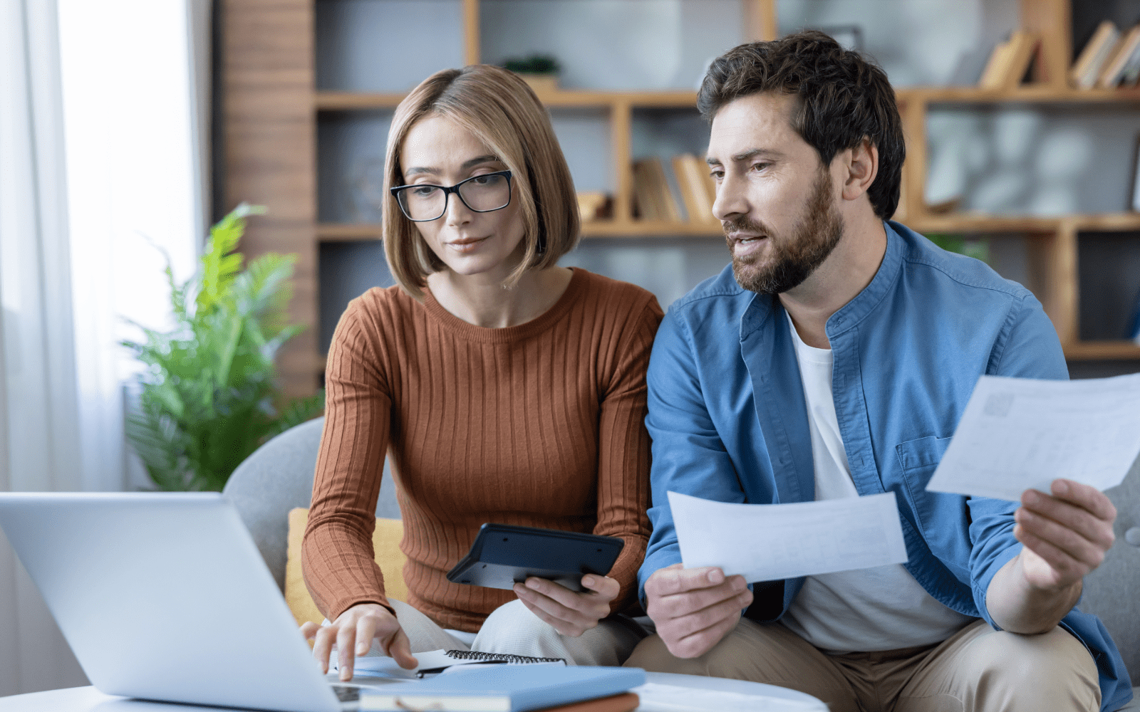 A homeowner reviewing financial documents