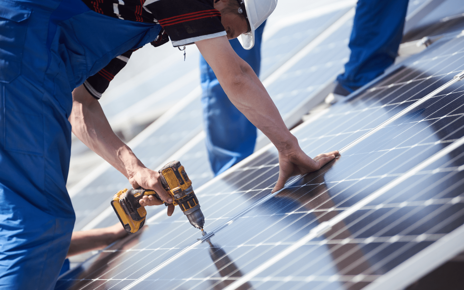 Powerfully Green solar installer completing residential solar panel installation in the Twin Cities metro area